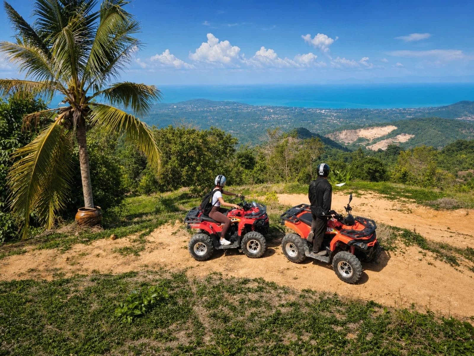 Trail Blazers ATV riders at a mountain overlook above the Koh Samui coastline