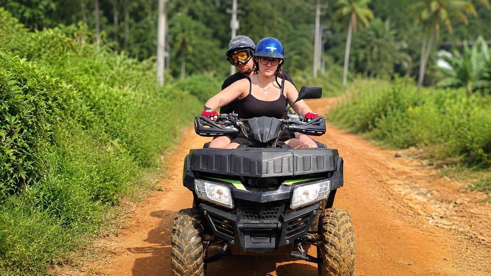 Two riders on a quad on a jungle dirt track, Wild Action Samui, Koh Samui ATV tours