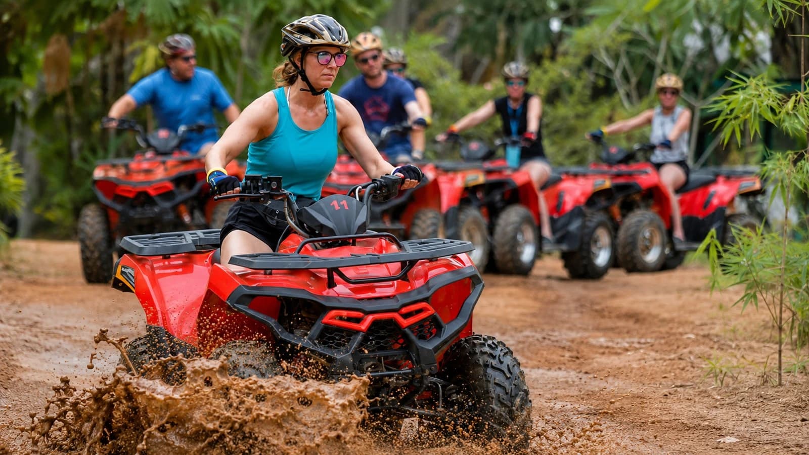 Group ATV tour riding a muddy jungle trail on Koh Samui